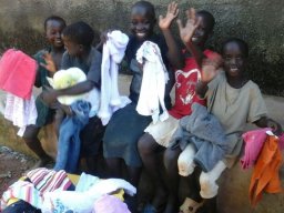 aba_destitute_kids_happy_with_gifts_of_clothings_20160830_1031211828